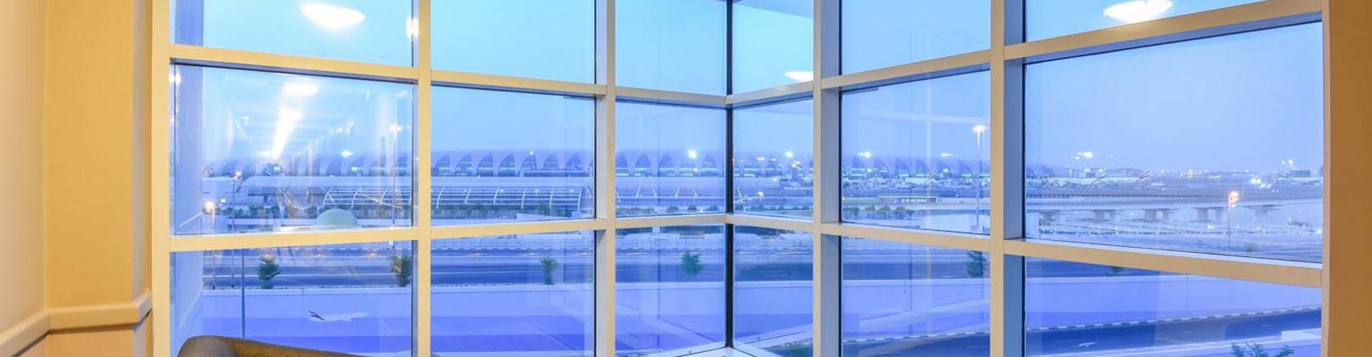 Night view of Dubai International Airport and nearby hotels